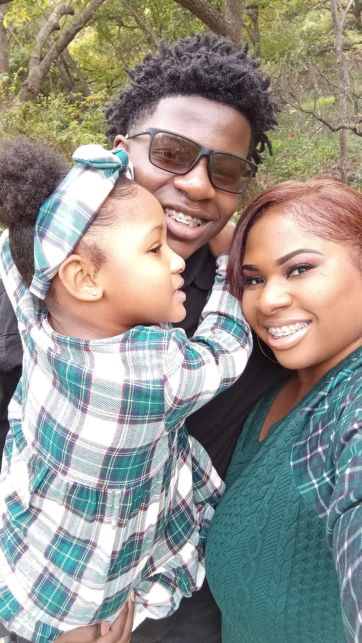 Cimone and her family together outdoors